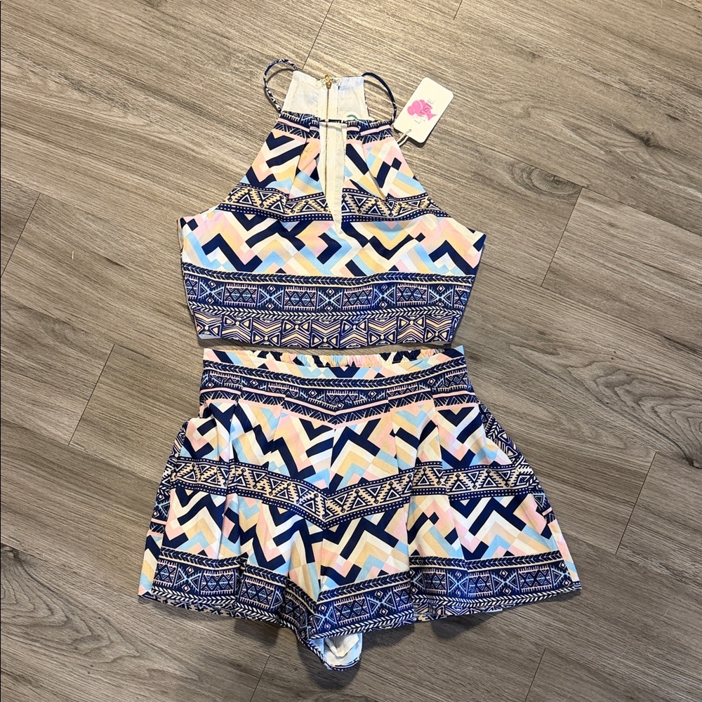 L'ATISTE Geometric Halter two piece set in Blue, Pink, and White